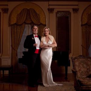 Actor James L. Perry and Tara Blumstein pose in the music parlor. Perry appeared as the butler, Franz in a rare stage appearance of 