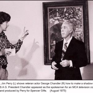 Director James L Perry teaches veteran character actor George Chandler how to make a shadow bunny on a Universal Studios project