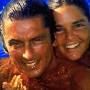 Still of Robert Evans and Ali MacGraw in The Kid Stays in the Picture (2002)