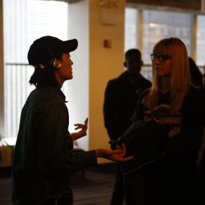 Caroline Mariko Stucky - Director of Photography, talking to actresses Julia Green & Shelby Finnie.