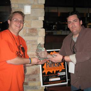 Steve Wright accepting The Steve Pearce Memorial Award from Brian Pearce Festival Director of The Wet Your Pants Comedy Film Festival