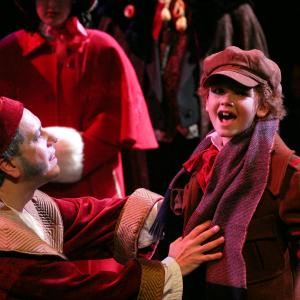 Scrooge with Tiny Tim in 