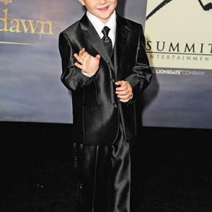 Billy Wagenseller The pint-sized star accessorized his black tux with black-and-white checkered sneakers. Read more: http://www.usmagazine.com/entertainment/pictures/inside-the-twilight-saga-breaking-dawn---part-2-premiere-20121211/26047#ixzz2CJRj