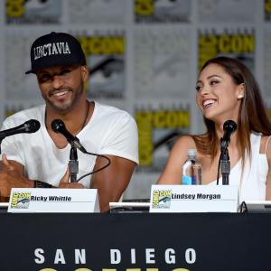 Ricky Whittle and Lindsey Morgan at event of The 100 2014