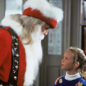 Still of Thora Birch and Leslie Nielsen in All I Want for Christmas 1991