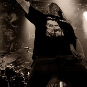 Performing vocals for Vital Remains in year 2010