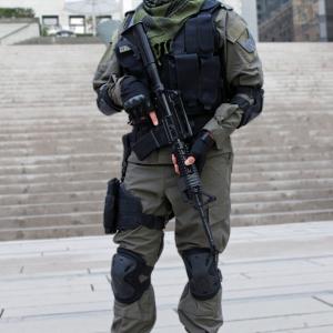 Lee Majdoub as NINER in Soldiers of the Apocalypse