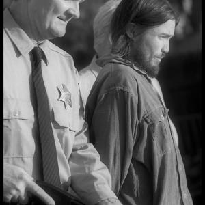 As Officer Preston With Ryan Kiser as Charles Manson in 