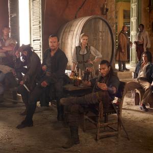 Still of Hakeem Kae-Kazim, Mark Ryan, Toby Stephens, Toby Schmitz, Zach McGowan, Luke Arnold, Jessica Parker Kennedy, Tom Hopper, Clara Paget and Hannah New in Black Sails (2014)