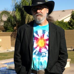 a psychedelic cowboy in the desert
