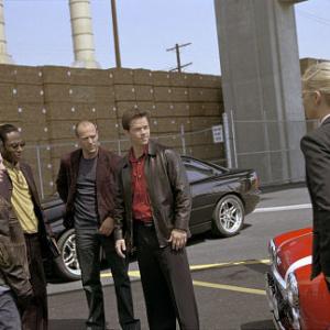 (Left to right) Seth Green as Lyle, Mos Def as Left Ear, Jason Statham as Handsome Rob, Mark Wahlberg as Charlie Croker and Charlize Theron as Stella.