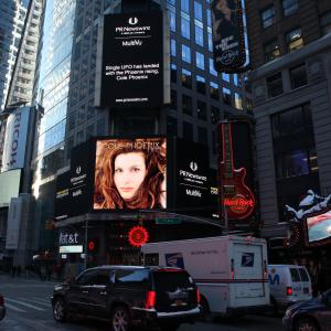 Cole Phoenixs pop single UFO single cover up on billboard in New York Tines Square