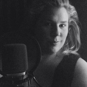 Kristin West records vocals for Seeking Valentina at SkyKross studios
