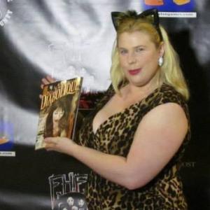 Kristin West on the red carpet at FANtastic HOrror Film Festival in San Diego, pictured with Diabolique Magazine.