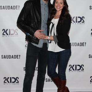 Adam David Thompson and Amber Davila at the premiere of 