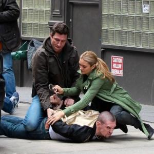 Action shot from a scene in NBCs IRONSIDE with Pablo Schreiber Spencer Grammer and Patrick Brana