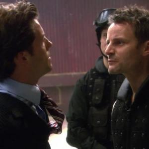 Still of Jamie Bamber and Ryan Robbins in Battlestar Galactica (2004)