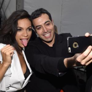Rosario Dawson and Mohammed Al Turki pose backstage at Naomi Campbells Fashion For Relief Charity Fashion Show during MercedesBenz Fashion Week Fall 2015 at The Theatre at Lincoln Center on February 14 2015 in New York City