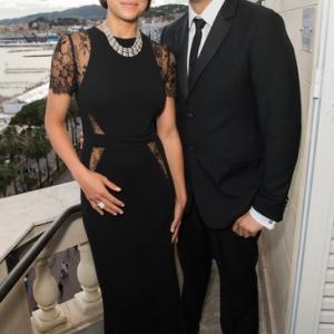 Michelle Rodriguez poses with Mohammed Al Turki as they visit The Avakian Suite during The 68th Annual Cannes Film Festival at The Carlton on May 15 2015 in Cannes France May 14 2015  Source Samir HusseinGetty Images Europe