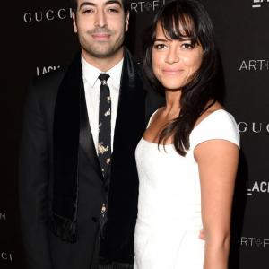 Producer Mohammed Al Turki and actress Michelle Rodriguez attend the 2014 LACMA Art  Film Gala honoring Barbara Kruger and Quentin Tarantino presented by Gucci at LACMA on November 1 2014 in Los Angeles California CREDIT JASON MERRITT