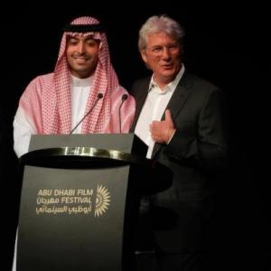 ABU DHABI, UNITED ARAB EMIRATES - OCTOBER 11: Mohammed Al Turki and Richard Gere speak on stage at Abu Dhabi Film Festival 2012 at Emirates Palace on October 11, 2012 in Abu Dhabi, United Arab Emirates.