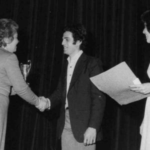 Rafy receiving trophy for music composition