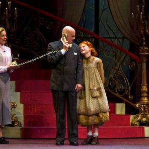 Sami Staitman as Annie with Larry Cahn as Warbucks and Emily Shoolin as Grace