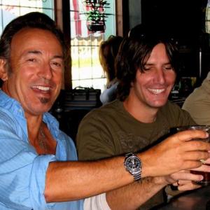 Bruce Springsteen & Chris Vaughn on set of Jerseyboy Hero sharing a victory beer.