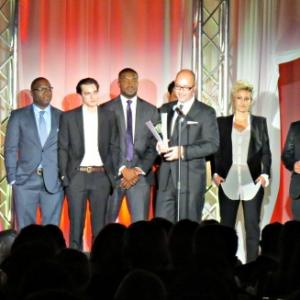 Continuum Cast accepting Best Dramatic Series award at the Leos 2014 Let to Right Ian Tracey Jen Spence Omari Newton Roger Cross Simon Barry Luvia Petersen John Cassar