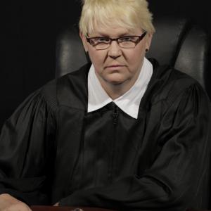 Teresa Parker as the Judge in The Coalition Music Video