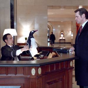 Still of Jim Carrey and Desmin Borges in Pono Poperio pingvinai (2011)