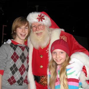 Heartland Christmas Charity, December 2009. Joey and Elise Luthman with Santa.