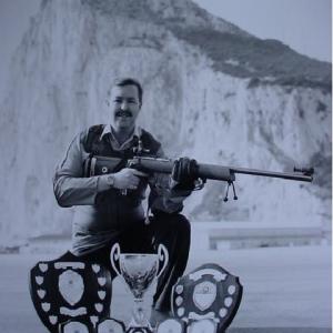 Steve with some of his awards for rifle marksmanship over the years Cira Gibraltar 1991