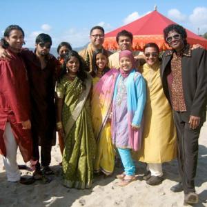 Kody and the Call Center on location at Zuma Beach for NBCs OUTSOURCED Episode 2122 Rajiv Ties the Baraat