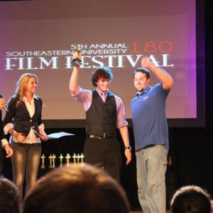 Coeditors Logan and Adam accepting the award for Best Editing at the 2011 180 Film Festival