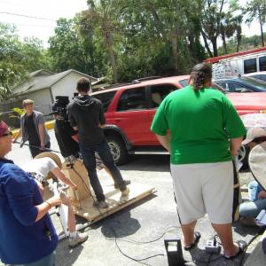 Logan watching a dollying shot from video village on the feature Pernicious Dream