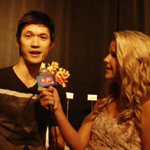 Madison Curtis and Harry Shum at the Young Story Tellers Event