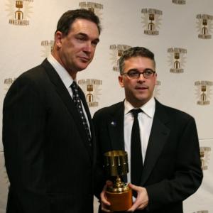 Patrick Warburton congratulates Jim Capobianco for Best Short Subject