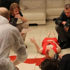Leanne Faulkner and Joerg Stadler talk to director Alex Stone on set In Which We Burn 2013