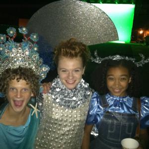 Annie Thurman with Amandla Stenberg and Ethan Jamieson on set for The Hunger Games