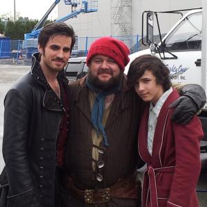 Dylan as Baelfire far right with Colin ODonald as Captain Hook far left and Chris Gauthier as Smee middle on set of ABCs Once Upon a Time 2013