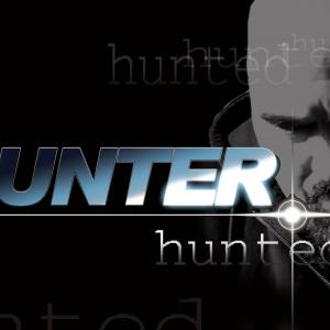 Hunter! Hunted! logo with Colt (Duane Johnson) featured.