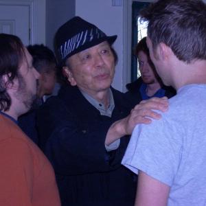 Being given some direction by James Hong!