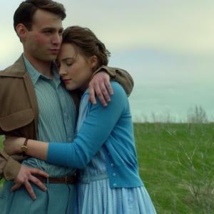 Still of Saoirse Ronan and Emory Cohen in Brooklyn (2015)