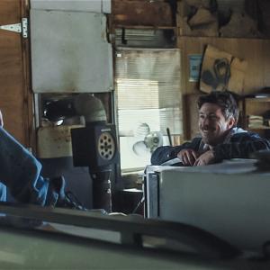 Still of Aidan Gillen and Emory Cohen in Beneath the Harvest Sky (2013)