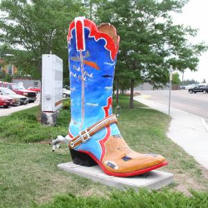 Public art installation Cheyenne Wyoming airport 2004 Around town various boots celebrated the railroad ranching nature Mine has the history of the airport with examples of every important aircraft type to fly in and out of Cheyenne The boot is n