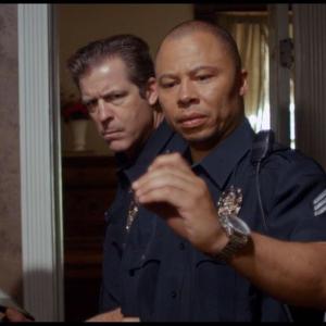 Still image from the thriller Psychos as Officer Cruz along with Cliff Davis
