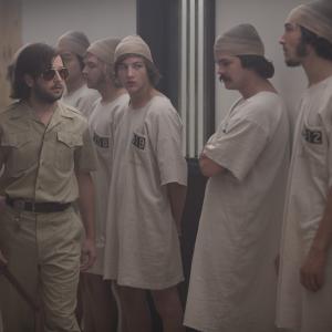 Still of Michael Angarano, Chris Sheffield, Brett Davern, Johnny Simmons, Ezra Miller, Ki Hong Lee and Tye Sheridan in The Stanford Prison Experiment (2015)