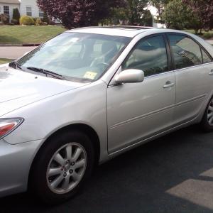 Silver Toyota Camry 2003 4door I also have good film car driving skills