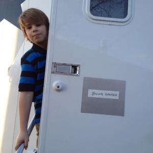 Daven Pitkin as Young Xander on set of Sea of Fire TV movie 2014uncredited  photo still